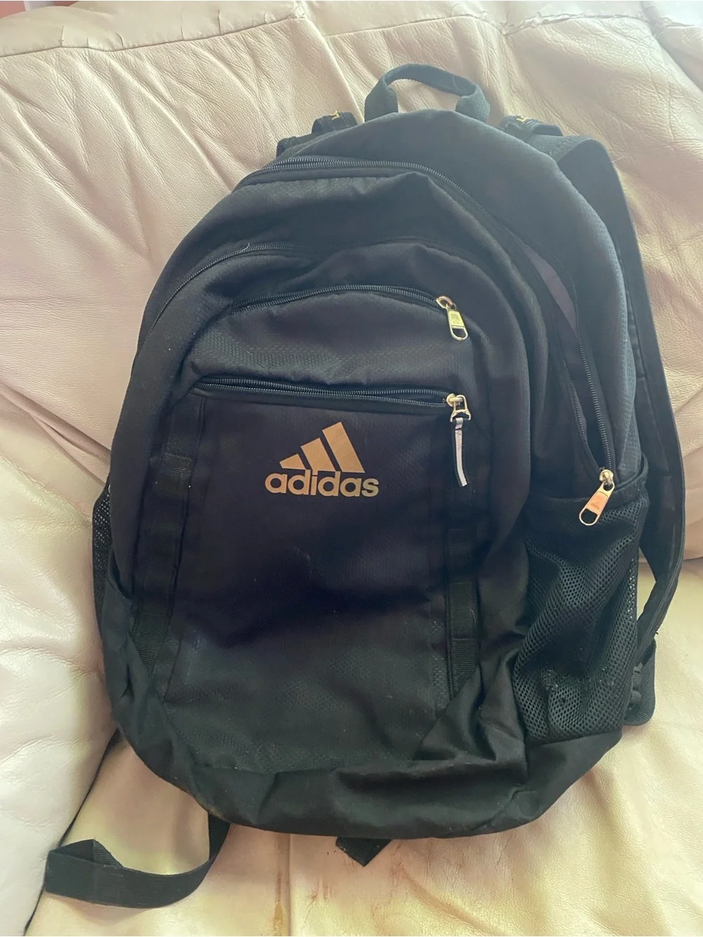 adidas Black Backpack with Gold Logo and Zipper Accents